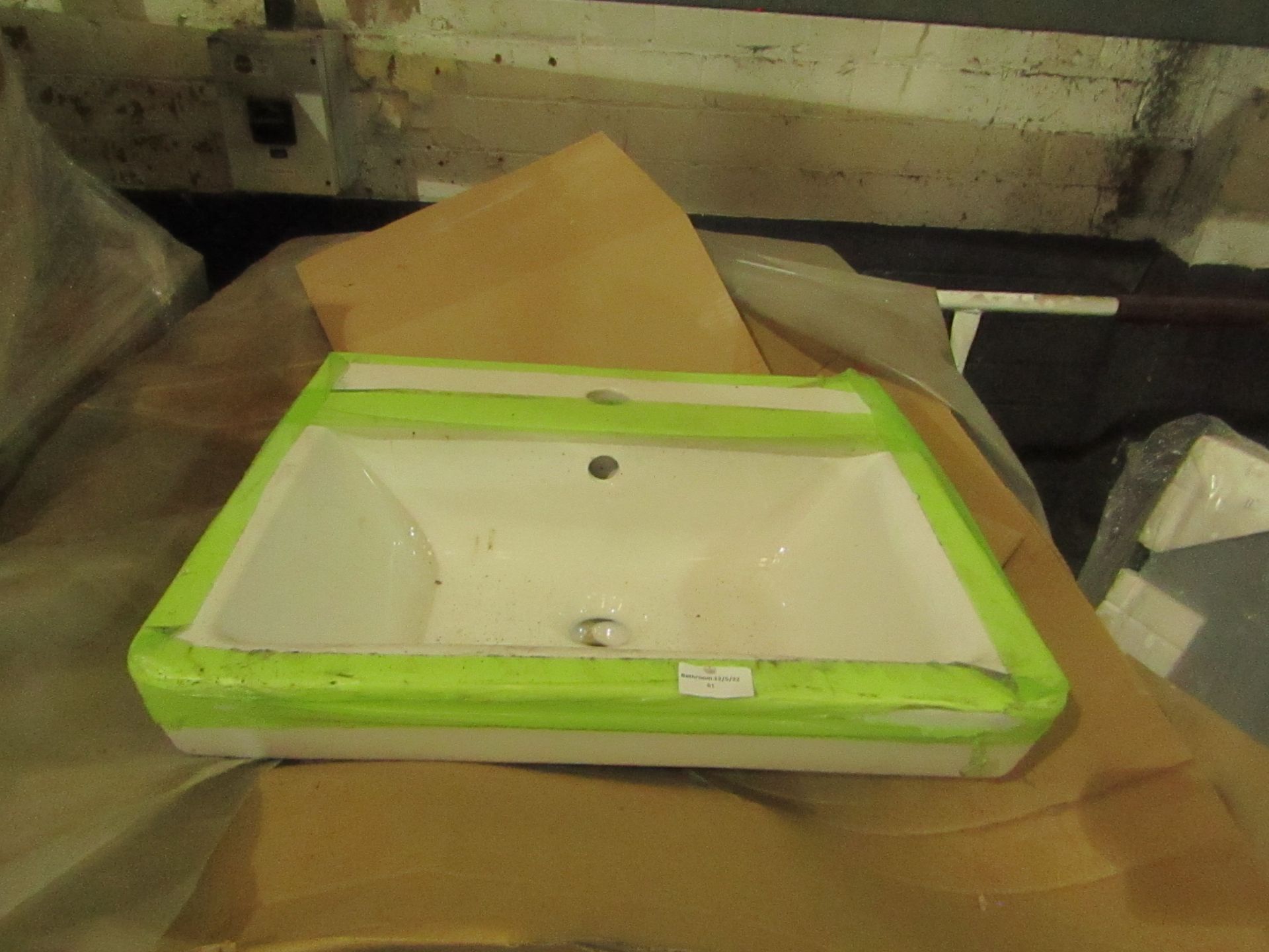 Laufen 600mm basin, new and boxed.