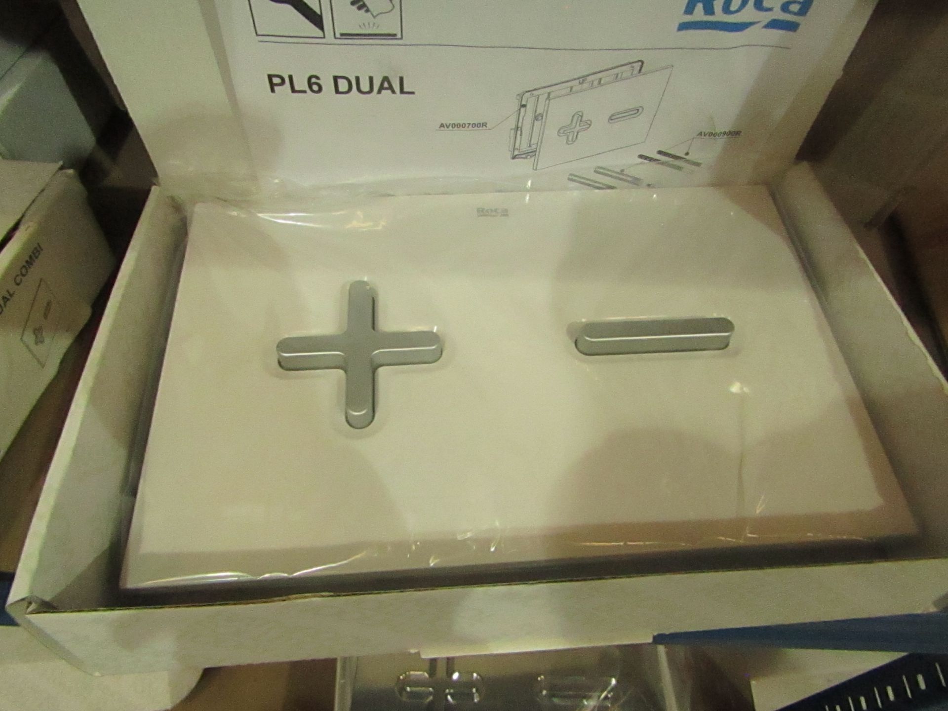 Roca PL6 Dual flush plate, new and boxed.