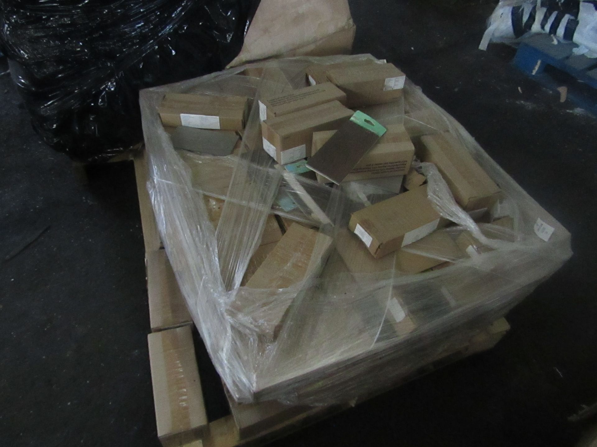 Pallet of Laminate flooring sample planks, could be repurposed to use in a parque style effect