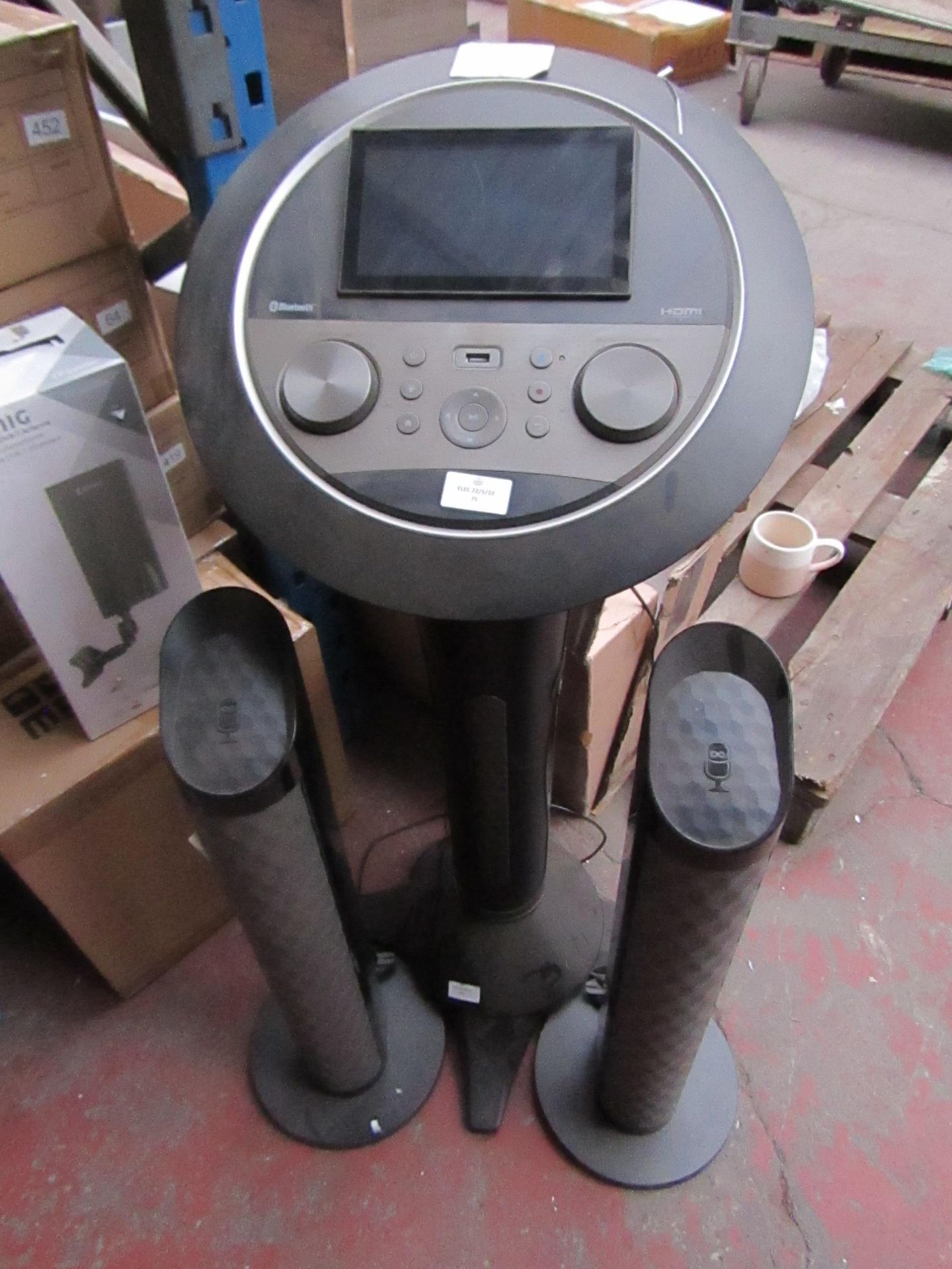 Singing Machine Karaoke machine with 2 microphones and speakers, the power cable is missing but we