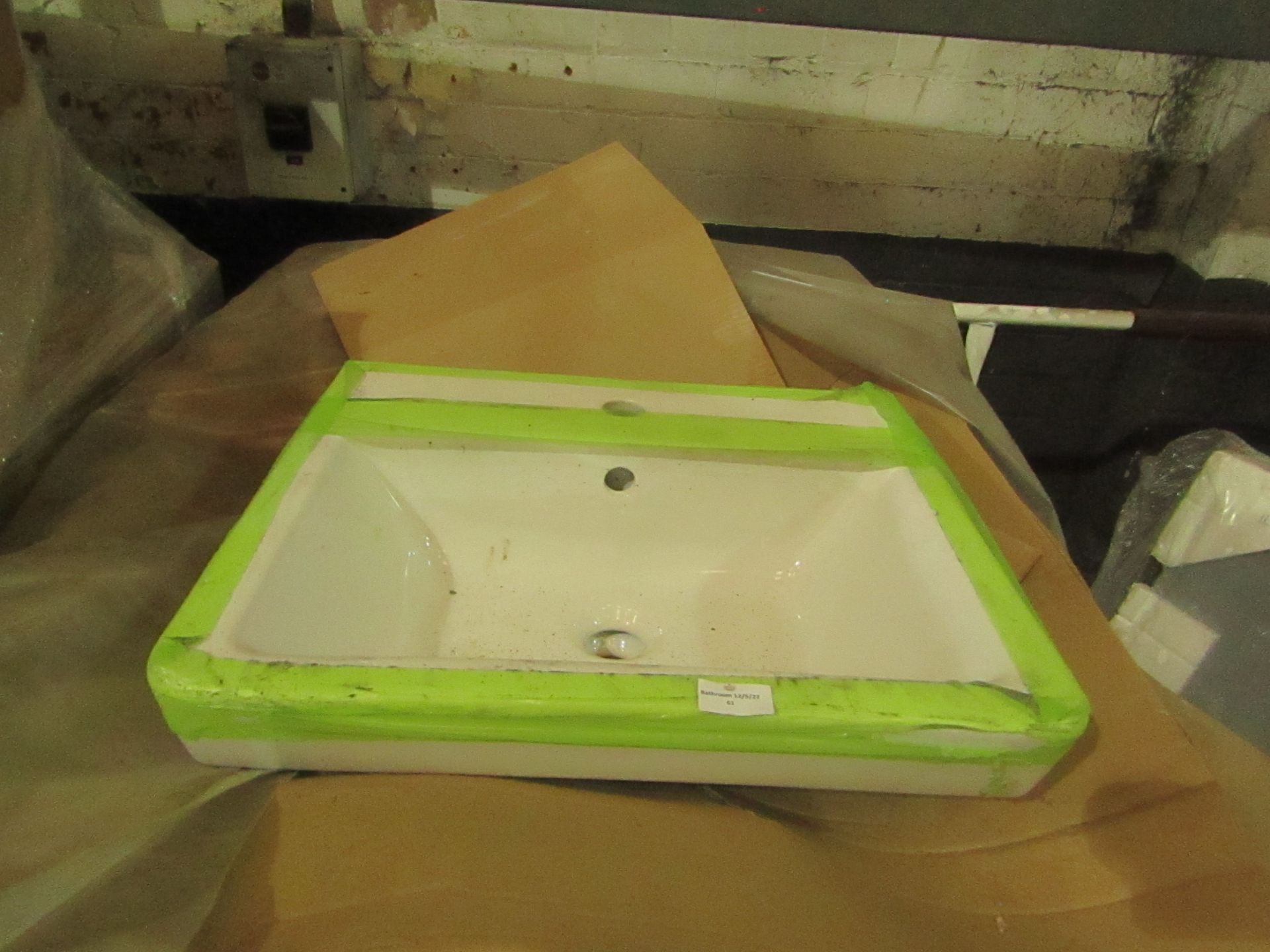 Laufen 600mm basin, new and boxed.