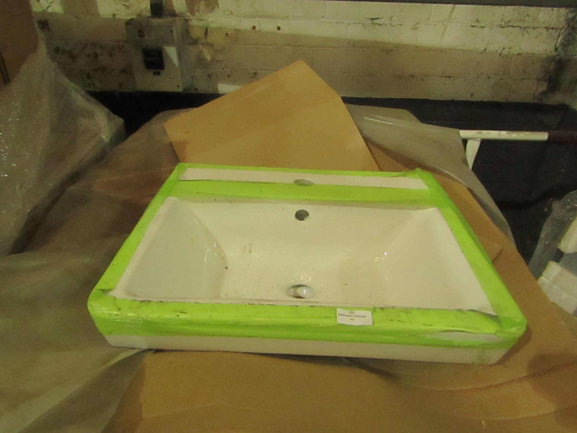 Laufen 600mm basin, new and boxed.