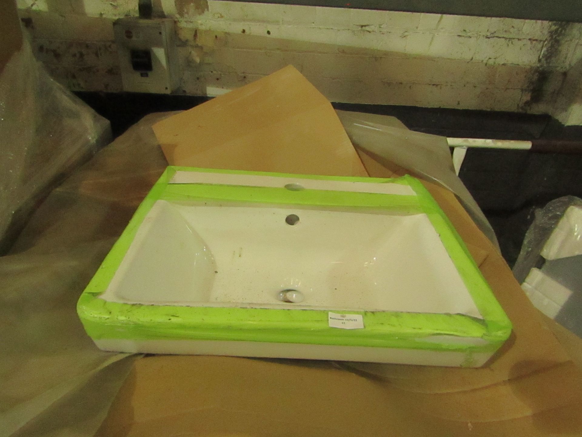 Laufen 600mm basin, new and boxed.