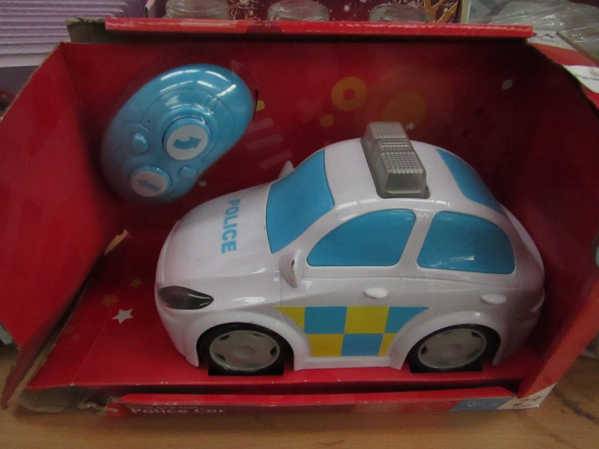 Carousel - Drive & Talk RC Police Car - Unused, Box Damaged.