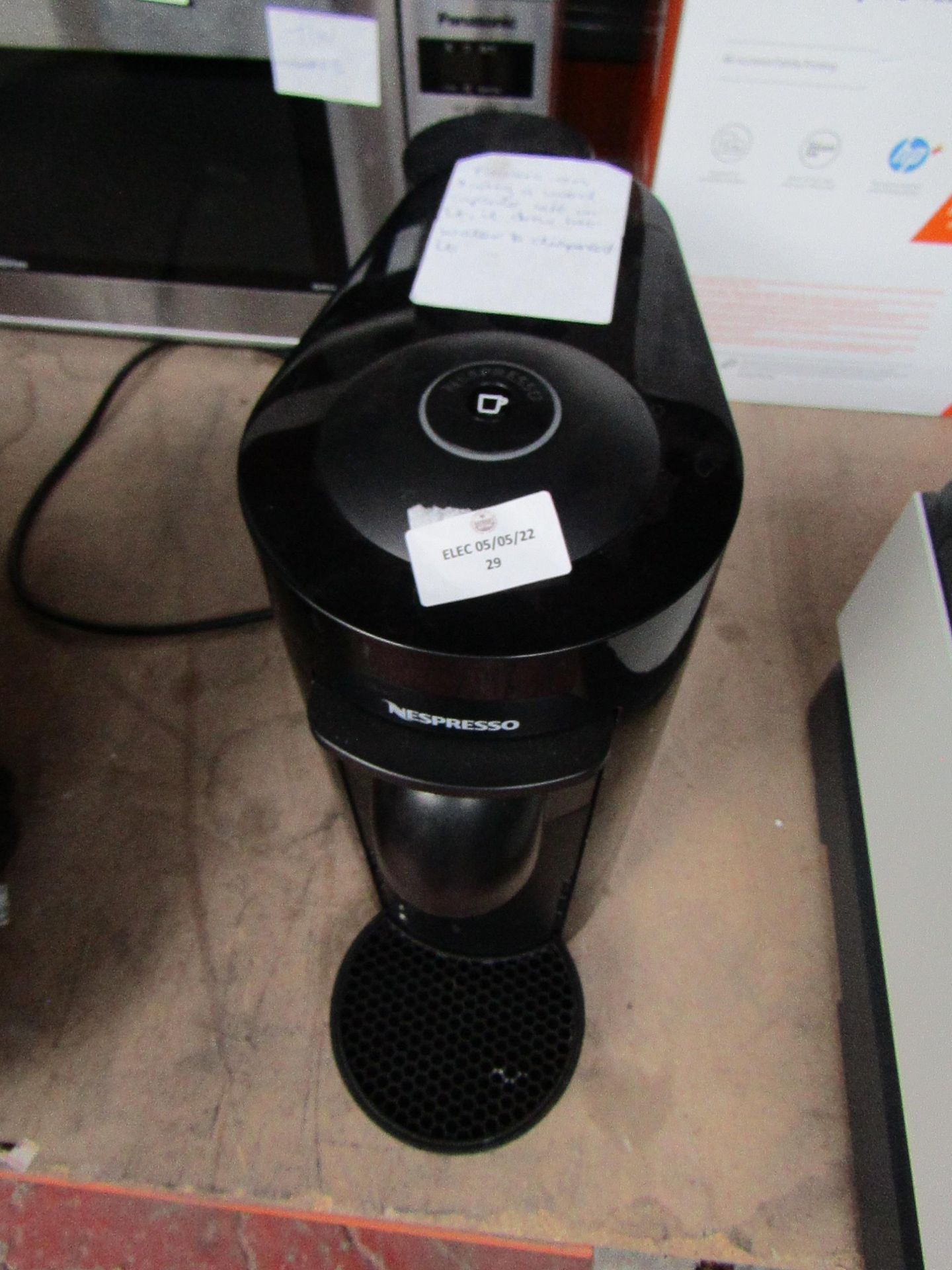 Nespresso Vertuo Plus Coffee capsule machine, no box but it had a coffee capsule in it so we ran