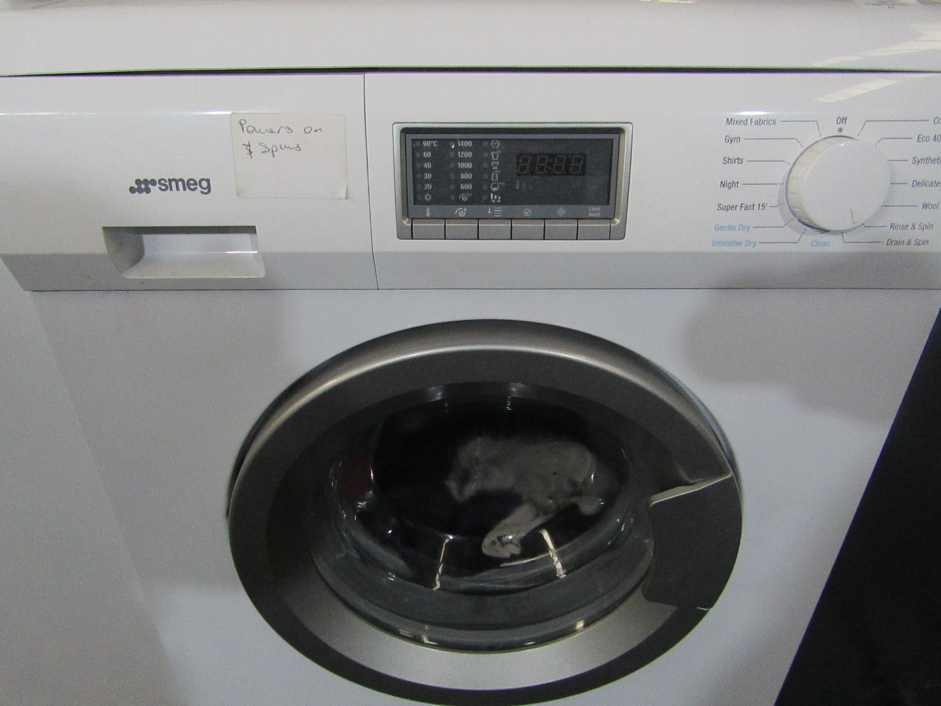 Smeg WDF147-2 Washing machine, powers on and the drum spins in a cycle, we haven't connected it to - Image 2 of 2