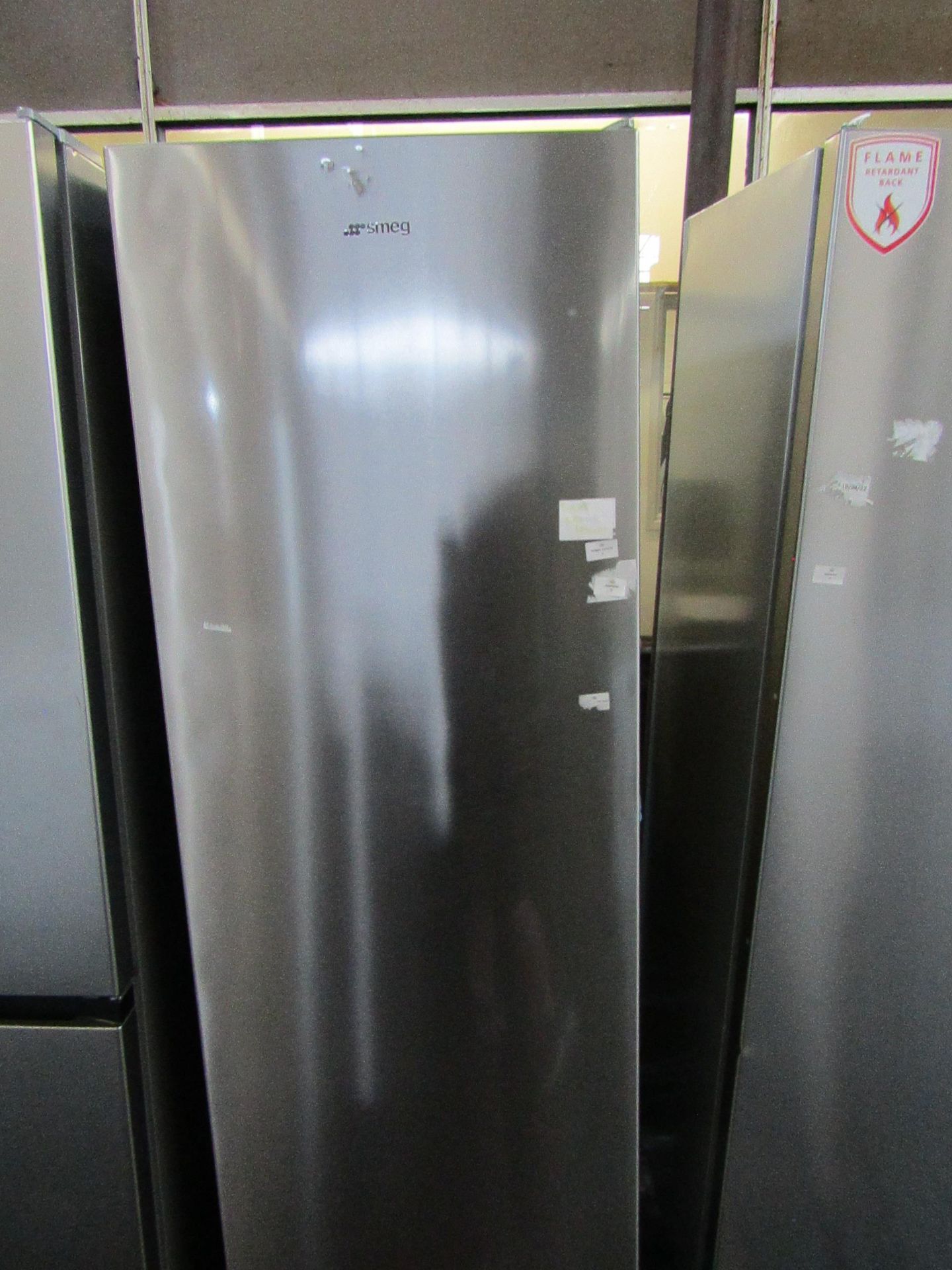 Smeg - Stainless Steel Tall Freestanding Fridge - Dents On Front, Not Getting Cold.