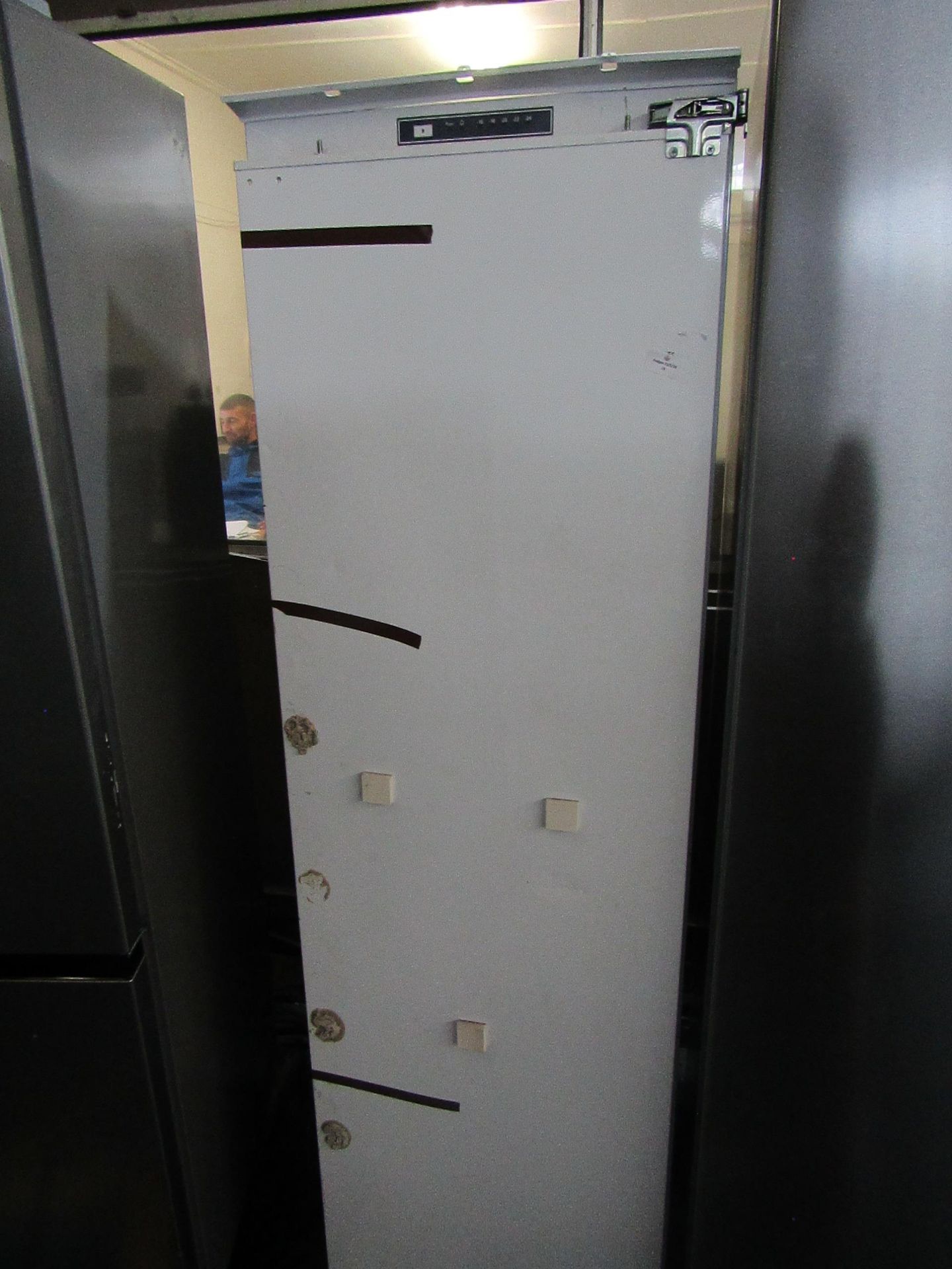 Unbranded - Intergrated Tall White intergrated Freezer- used but gets cold