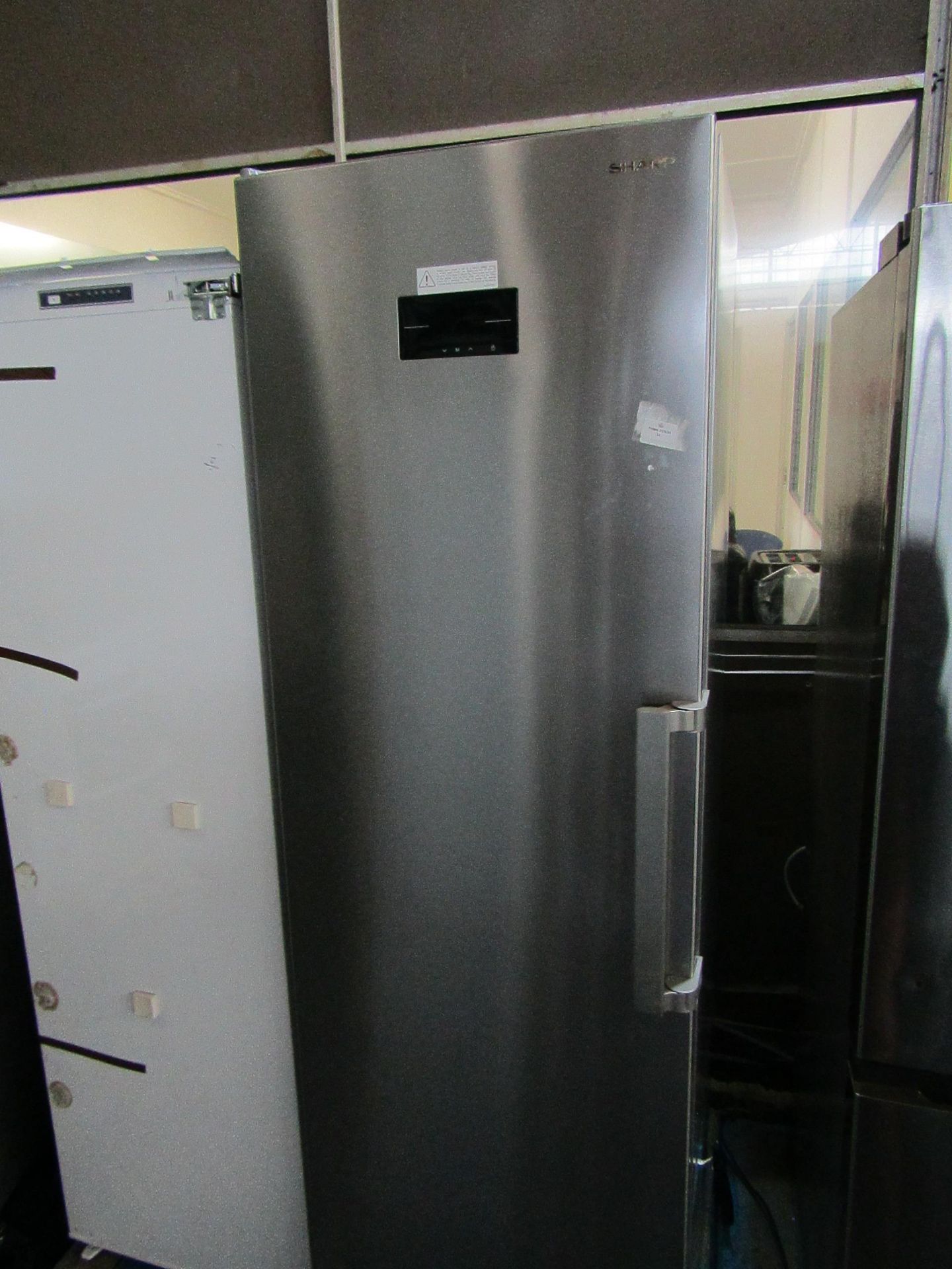 Sharp Tall Silver Freestanding Freezer - used, not getting cold