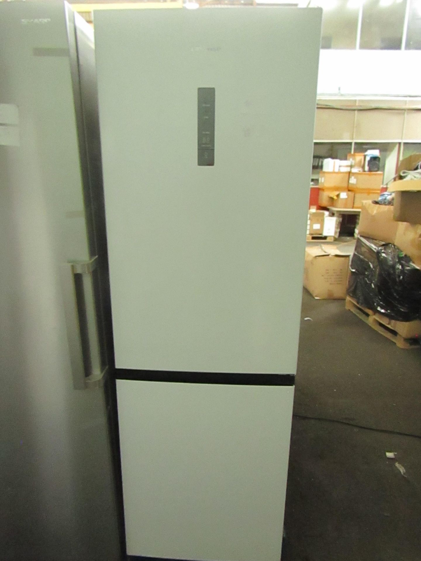 Hisense 60/40 Fridge freezer, Powers on and gets cold in both fridge and freezer, has a small