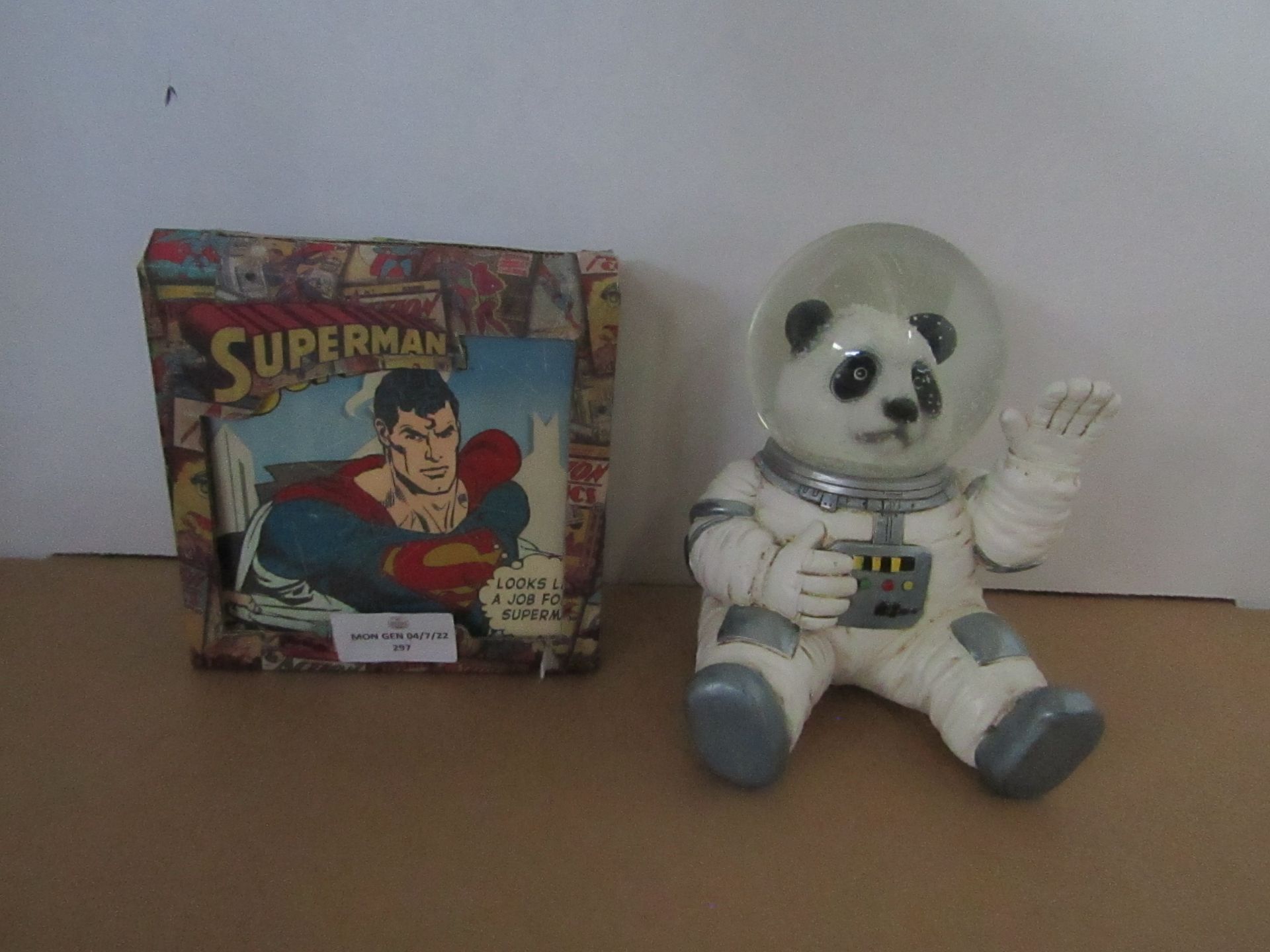 1x Superman - Money Bank - Unused & Boxed. 1x Snowglobe - Astronaut Panda - No Packaging.