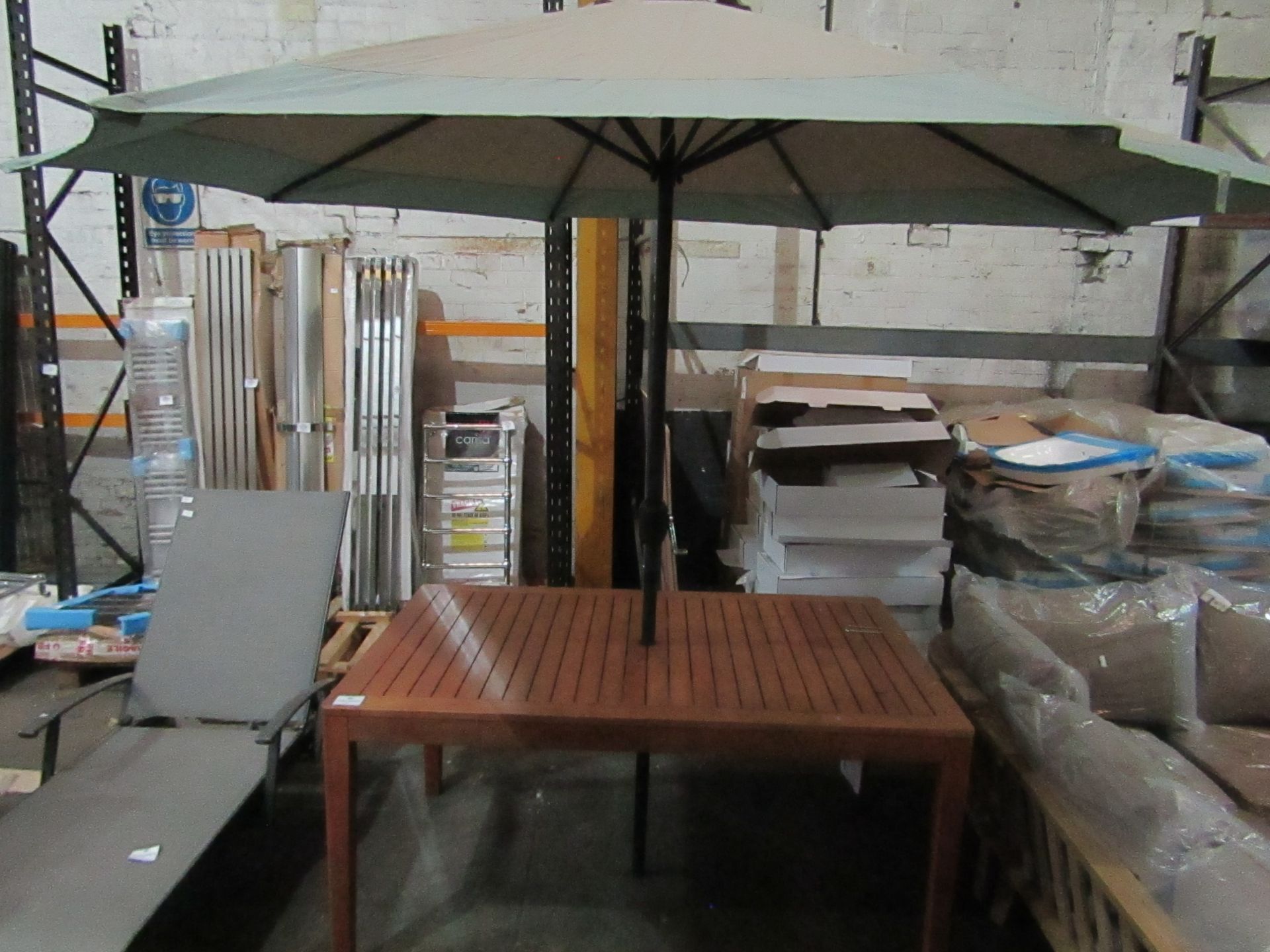 VAT 1x Aylesbury Dining Table With Parasol - Both are in Very Good Condition.