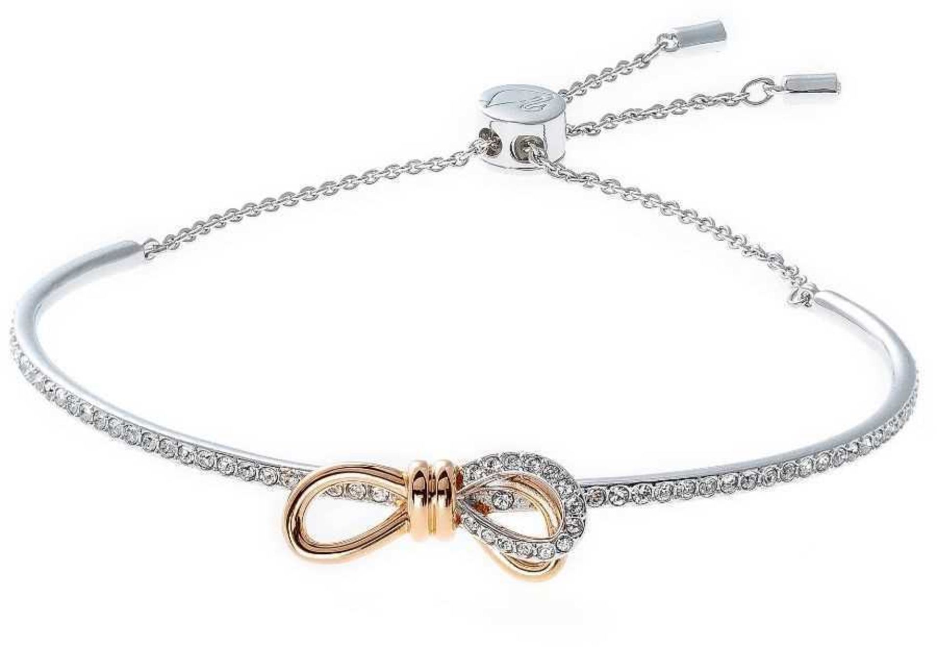 Swarovski Lifelong Bow Crystal and mixed metal bracelet.