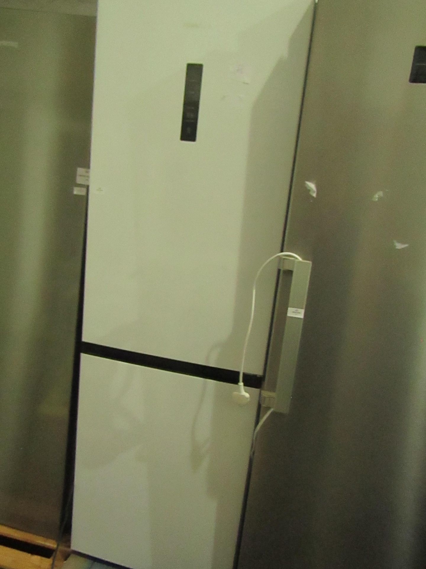 Hisense 60/40 fridge freezer, tested working for coldness in both fridge and freezer and it is in