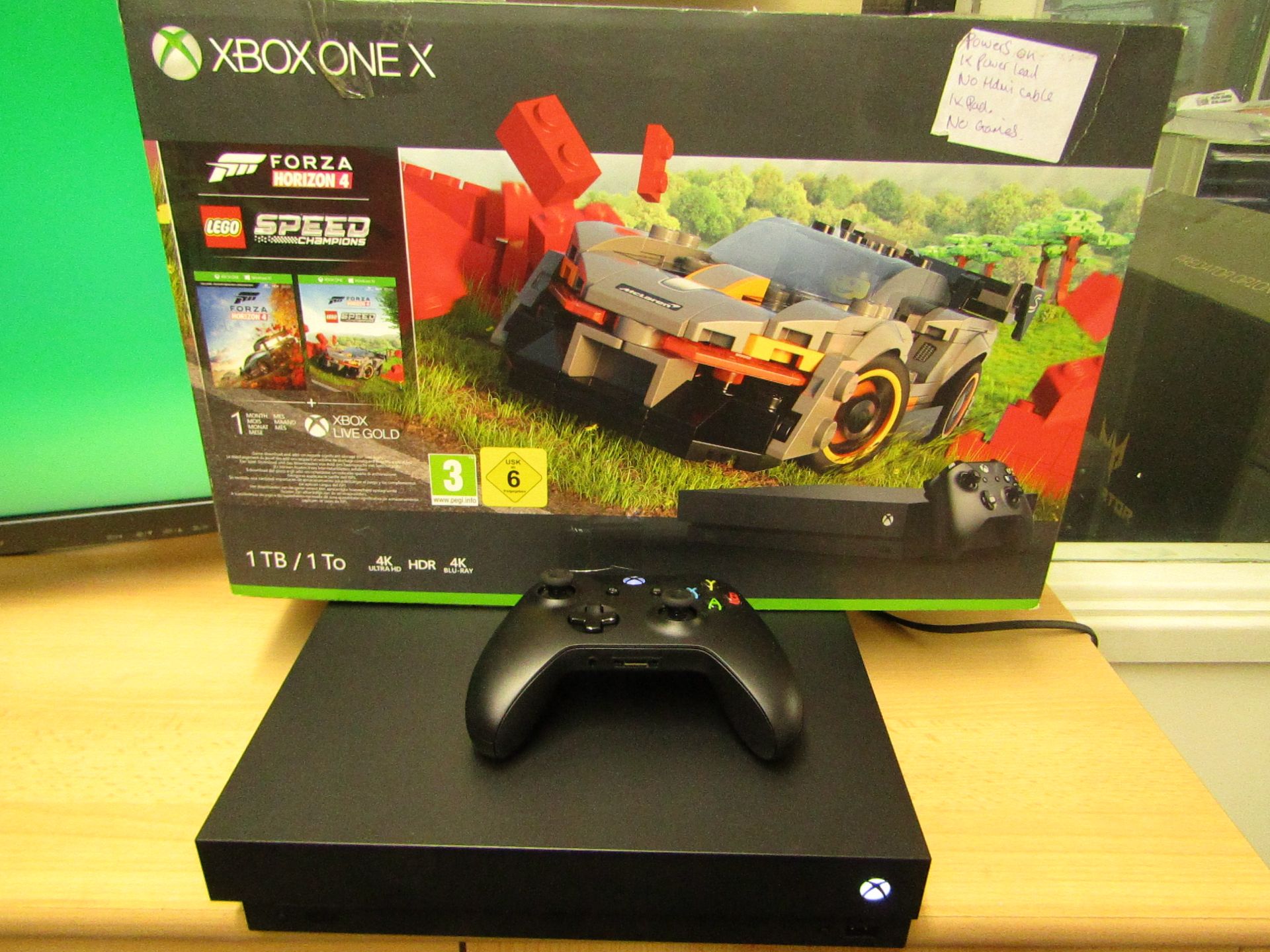 Xbox one X 1TB games console, powers on and goes through to Home page, comes with a controller,