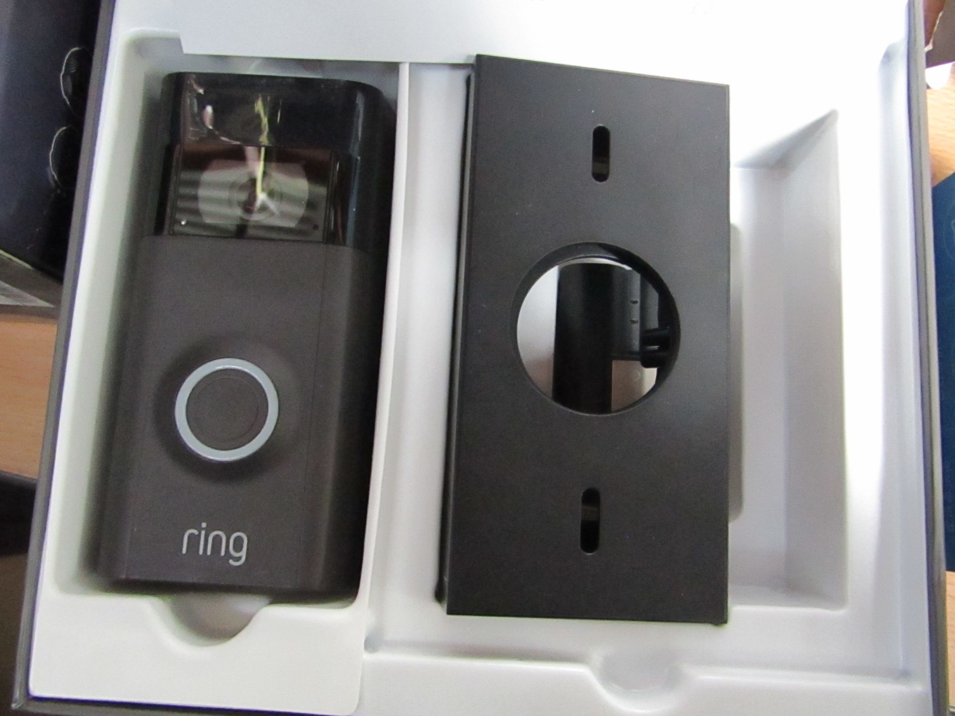 Ring Door Bell 2, comes in the original box with the door bell unit, battery and mounting bracket,