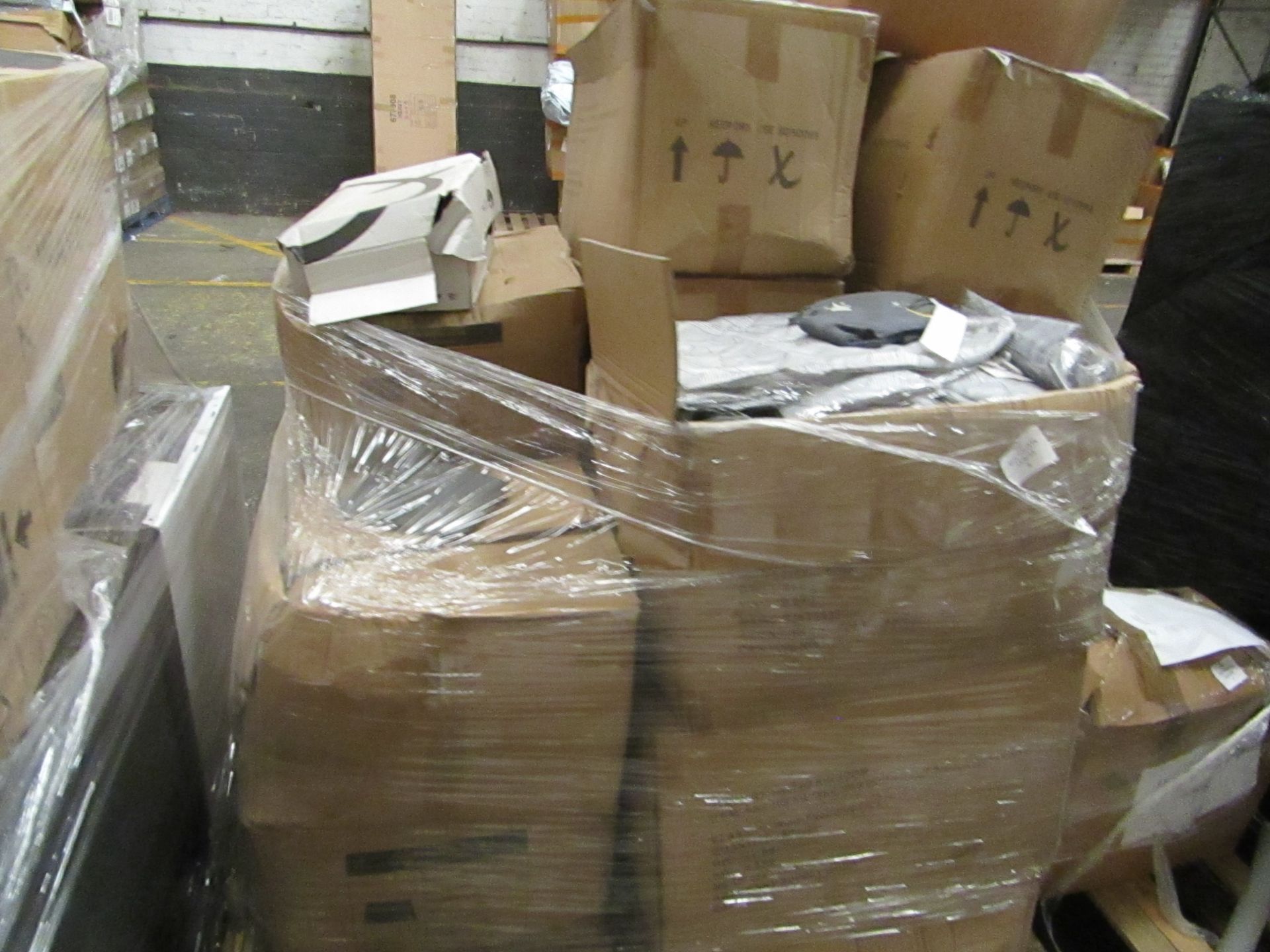 PALLET OF OVER 100 TRAVEL BAGS CONTAINING EYE MASK,EARPHONE, TOOTHBRUSH & Toothpaste & socks. All