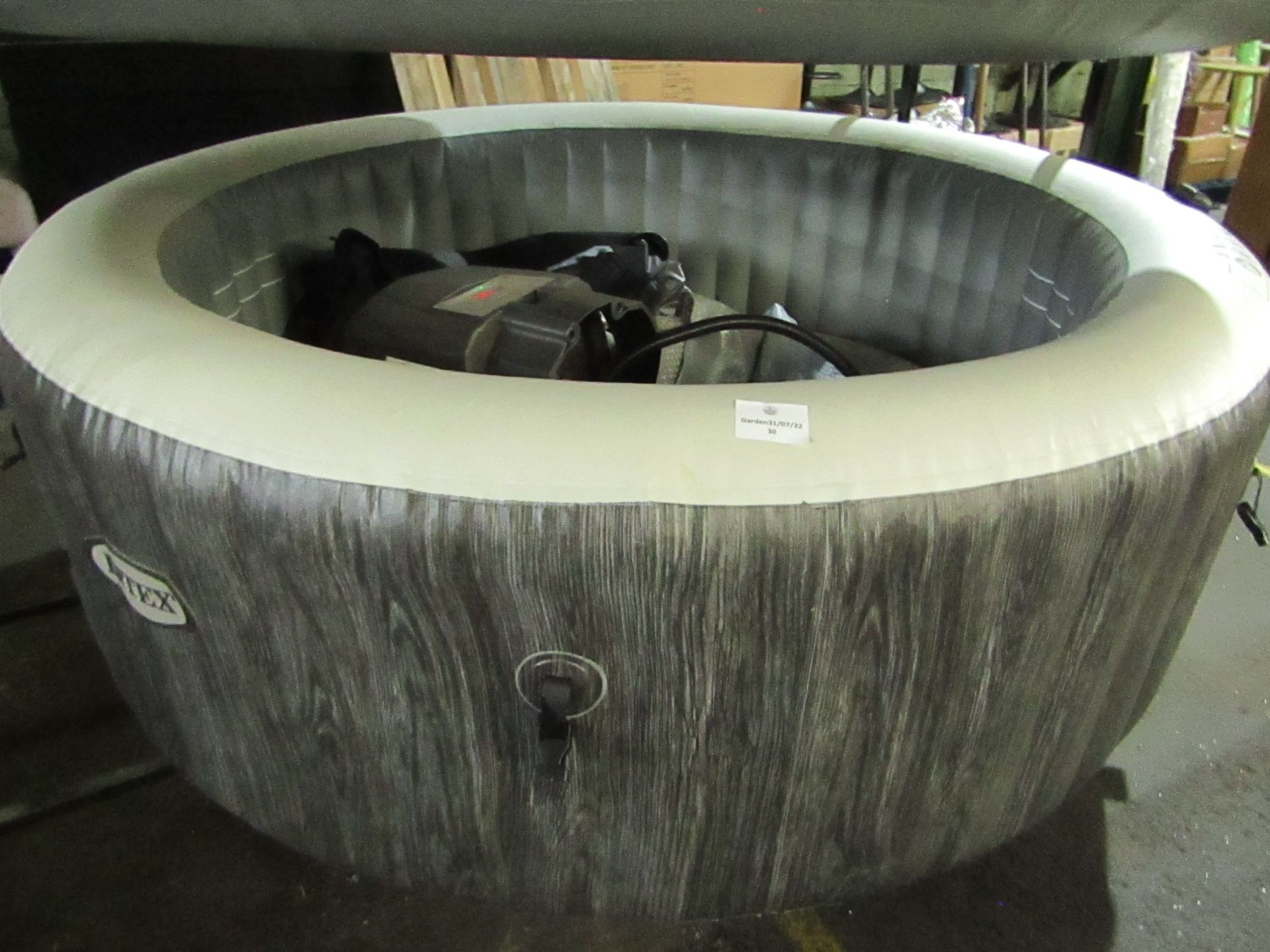 Intex Inflatable hot tub, the pump blows hot air and the hot tub inflates and has stayed inflated