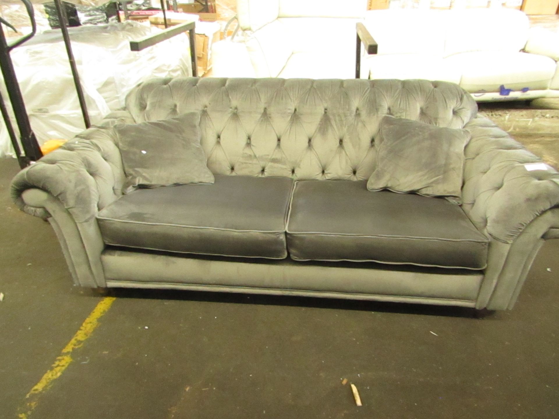 2 seater Grey Velour style button back sofa, in good condition