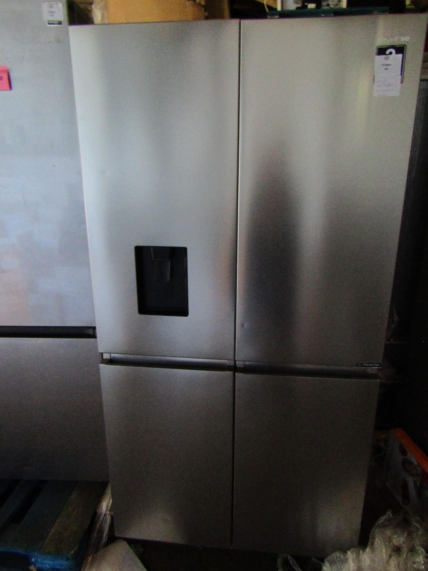 Hisense 4 section american style fridge freezer, unable to check as someone has taken the hinges off