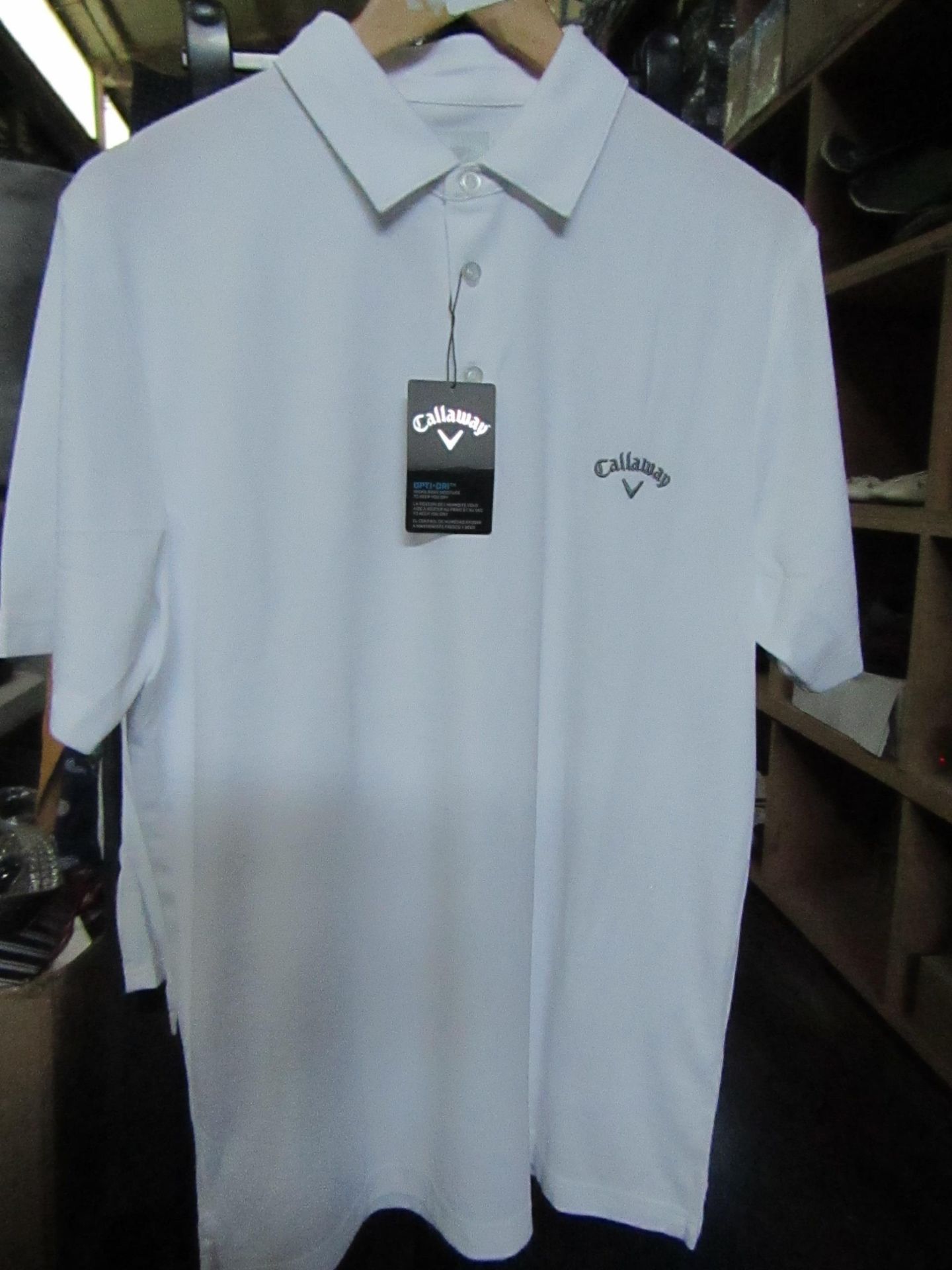 Callaway Golf Polo Shirt, new with tag, size medium