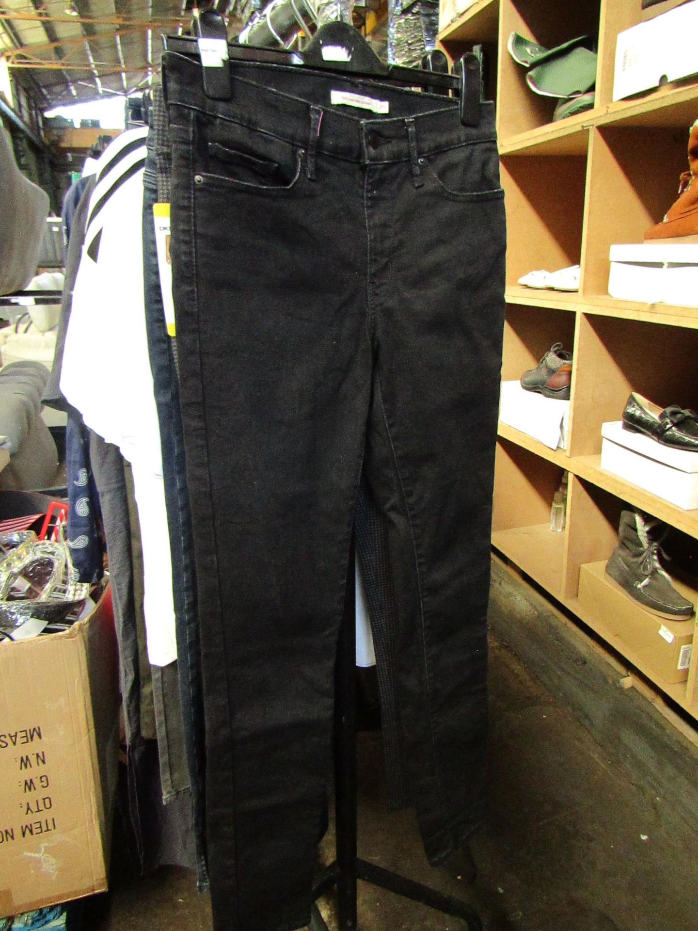 Levi311 Shaping Skinny jeans, size 29W, look to have been used and has a couple of marks on them but