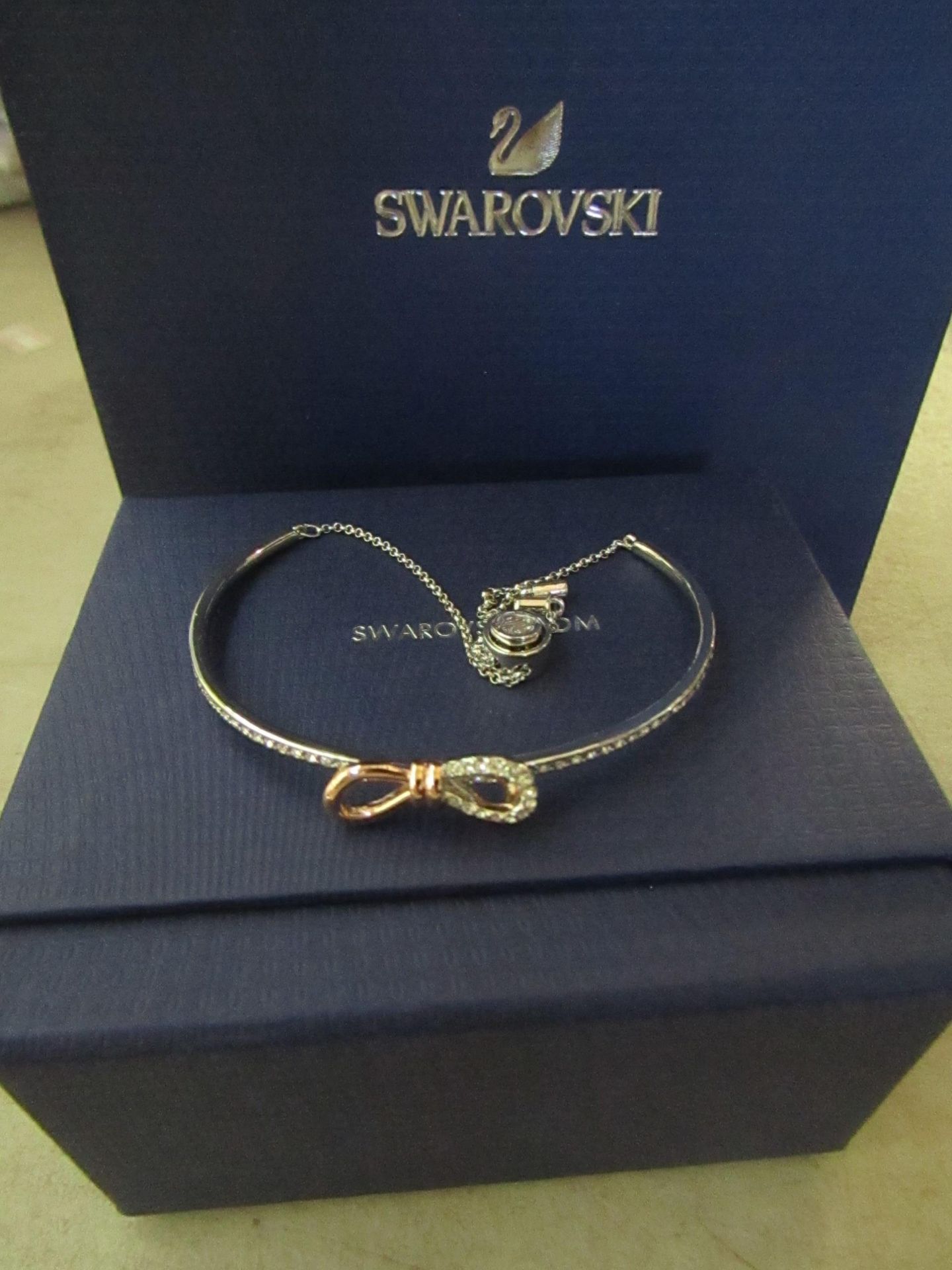 Swarovski Lifelong Bow Crystal and mixed metal bracelet, new with presentation box and gift bag