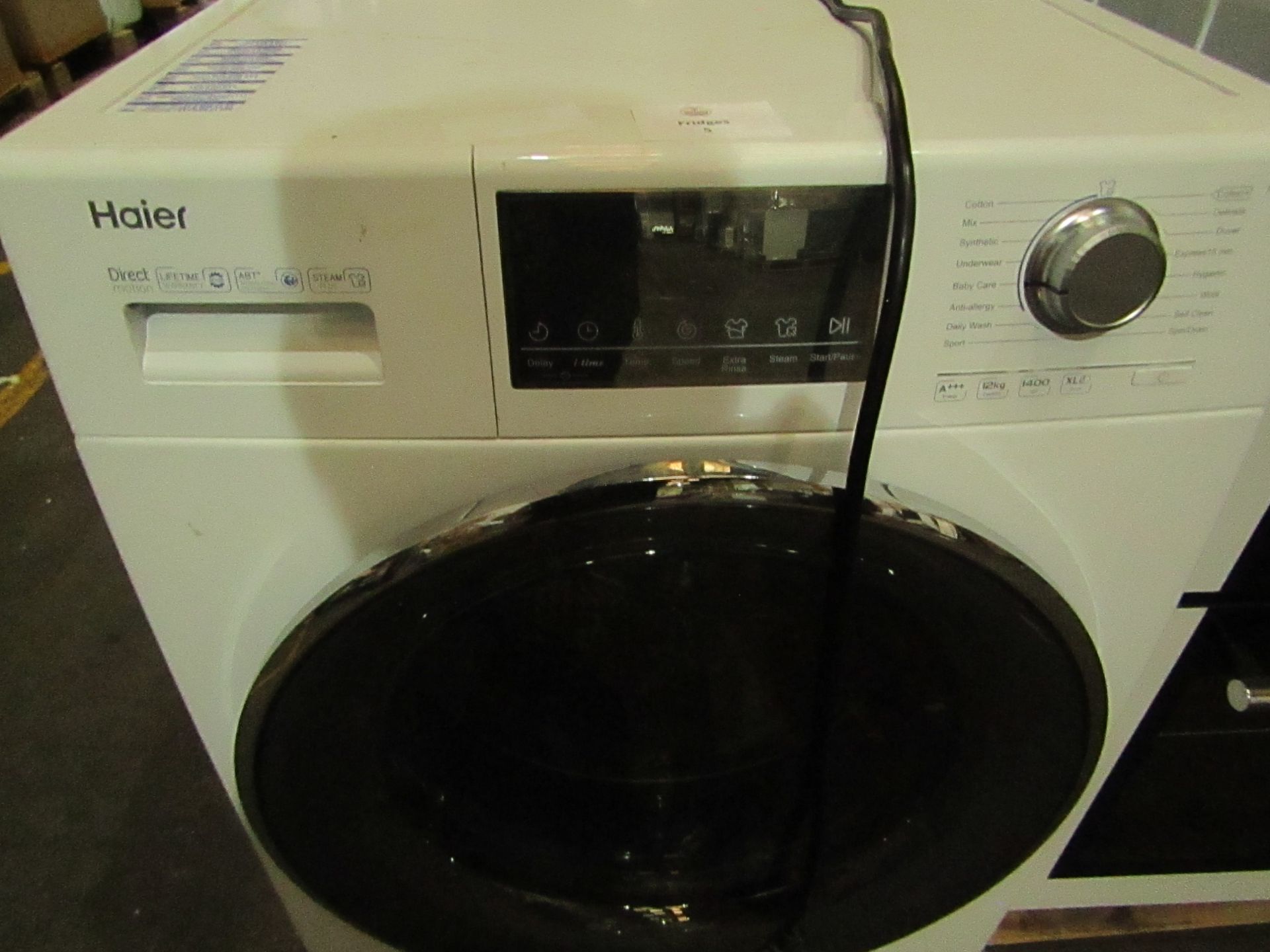 Haier HW120-B14876 washing machine, powers on and spins, we havent connected it to water or tested - Image 2 of 2