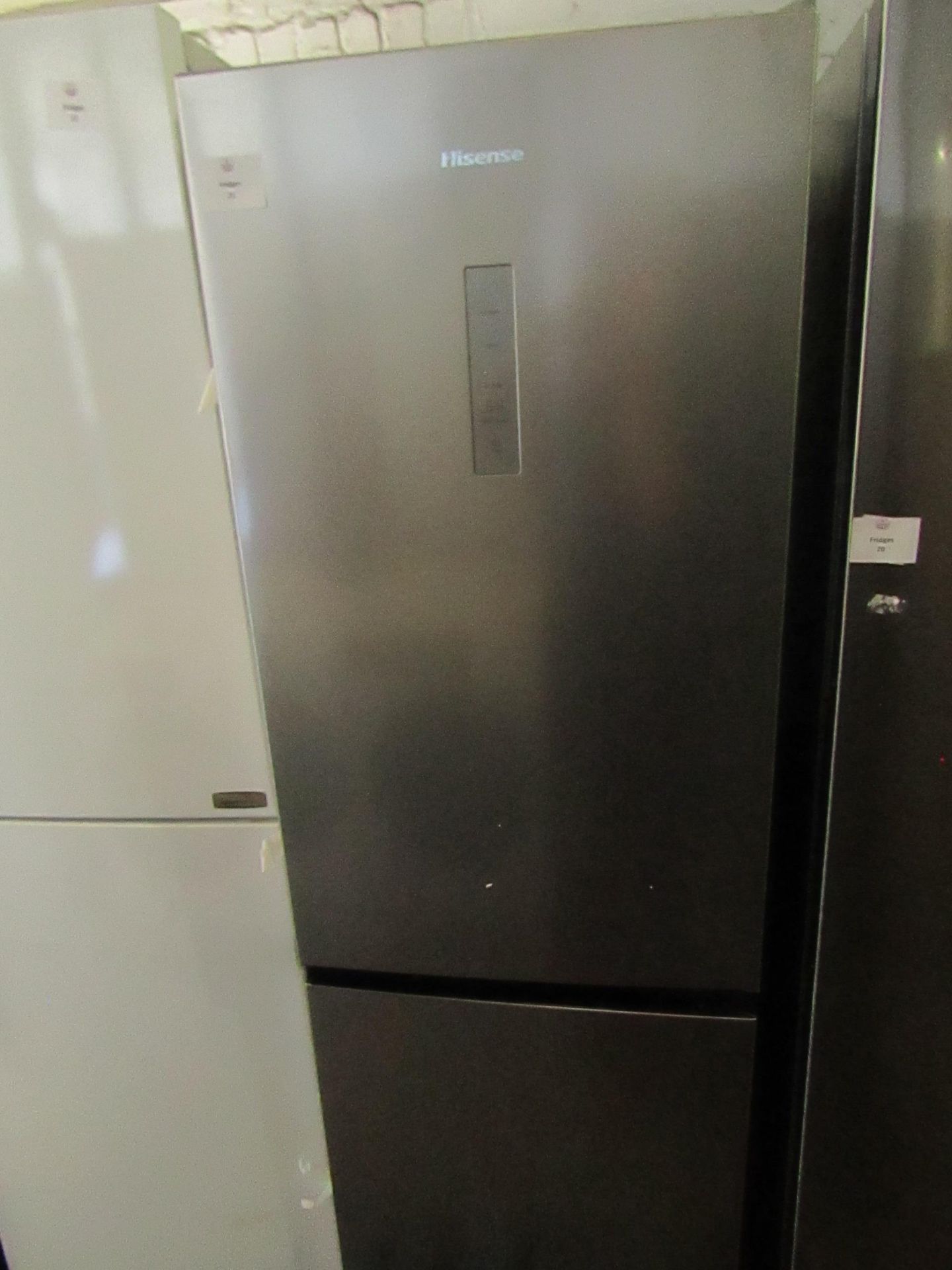 Hisense 60/40 Fridge freezer, tested working for coldness in both parts, looks unused inside but has