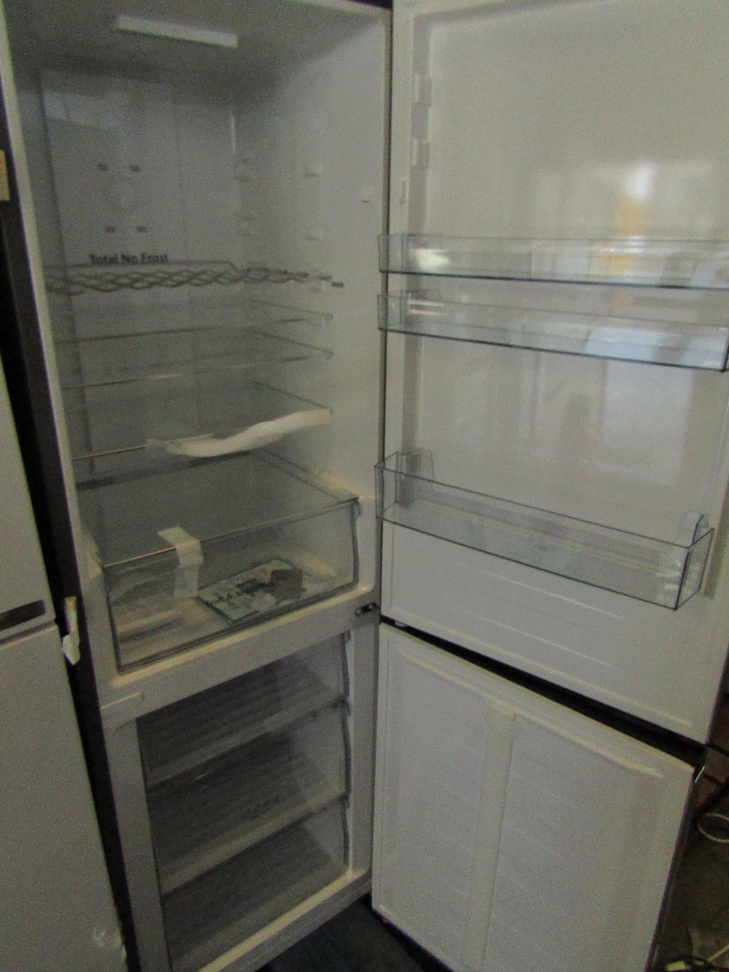 Hisense 60/40 Fridge freezer, tested working for coldness in both parts, looks unused inside but has - Image 2 of 2