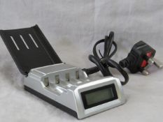 Super Quick Battery Charger for Both AA and AAA batteries, new