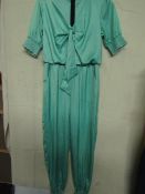 Debanded green jumpsuit, new, size unknown