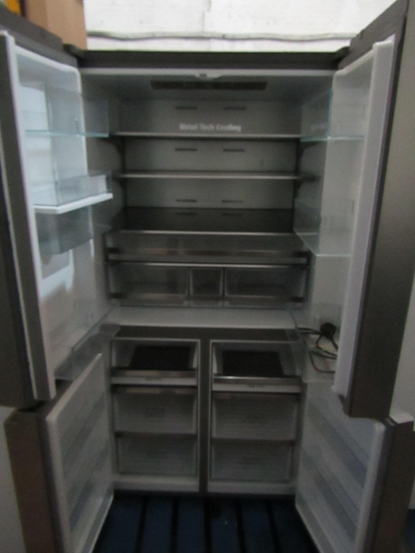 Hisense 4 door american style fridge freezer with water dispoenser, the plug and cord has been - Image 4 of 4