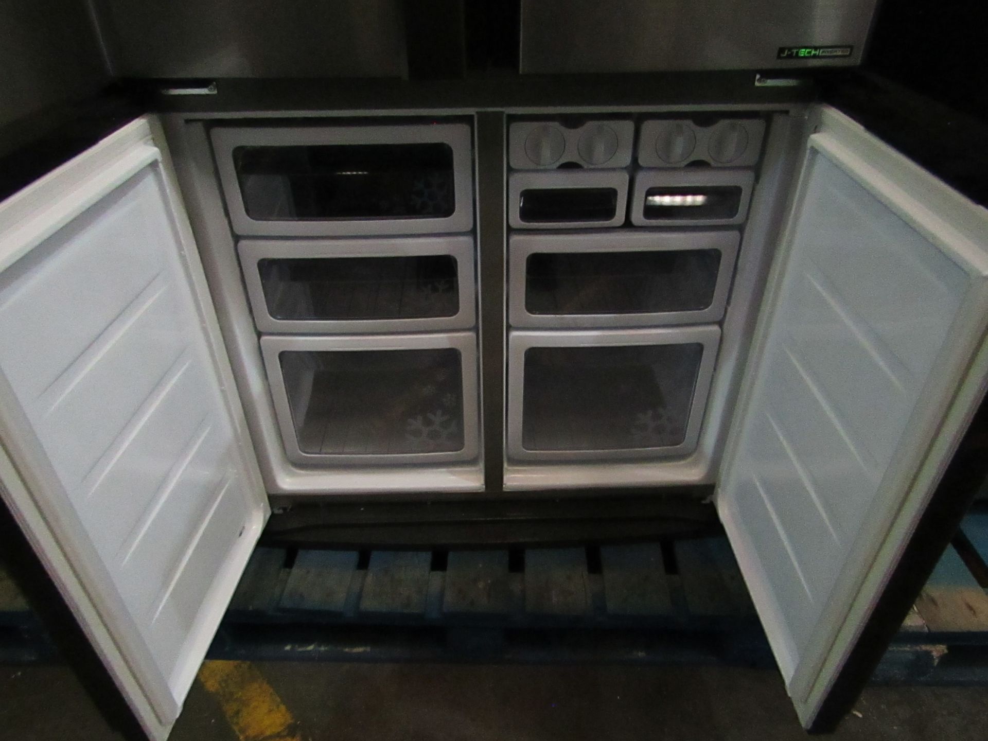 Sharp 4 door american fridge freezer, getting cold in both compartments when plugged in, has a - Image 4 of 4