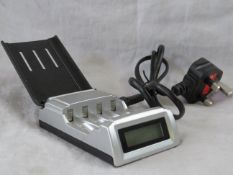 Super Quick Battery Charger for Both AA and AAA batteries, new