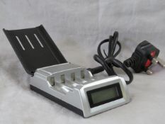 Super Quick Battery Charger for Both AA and AAA batteries, new