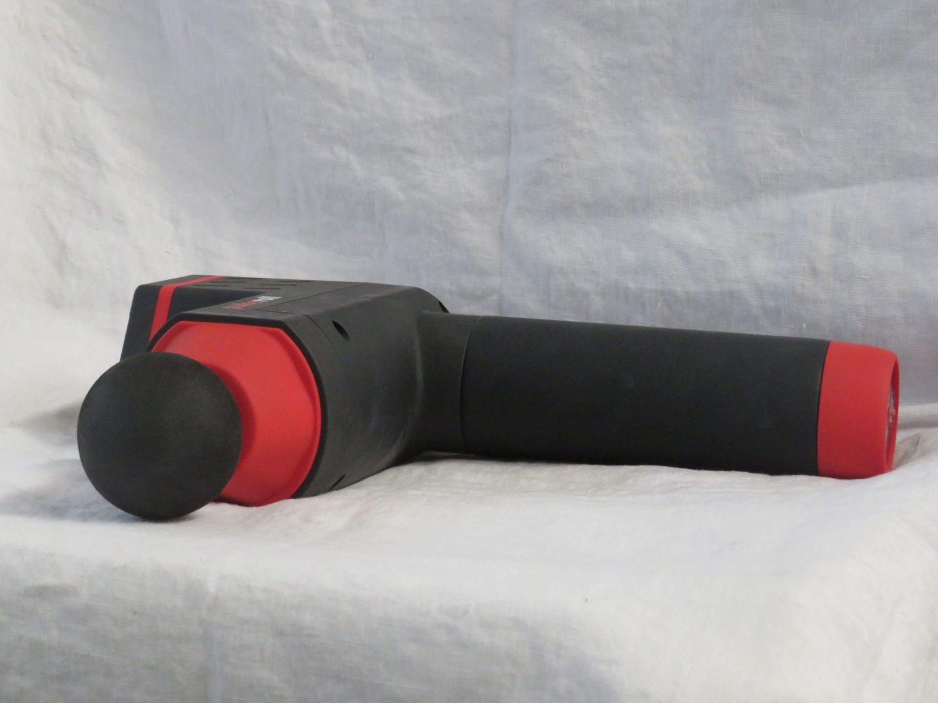 Pulse roll Percussion Massage Gun, tested working for percussion with the power it currently has,