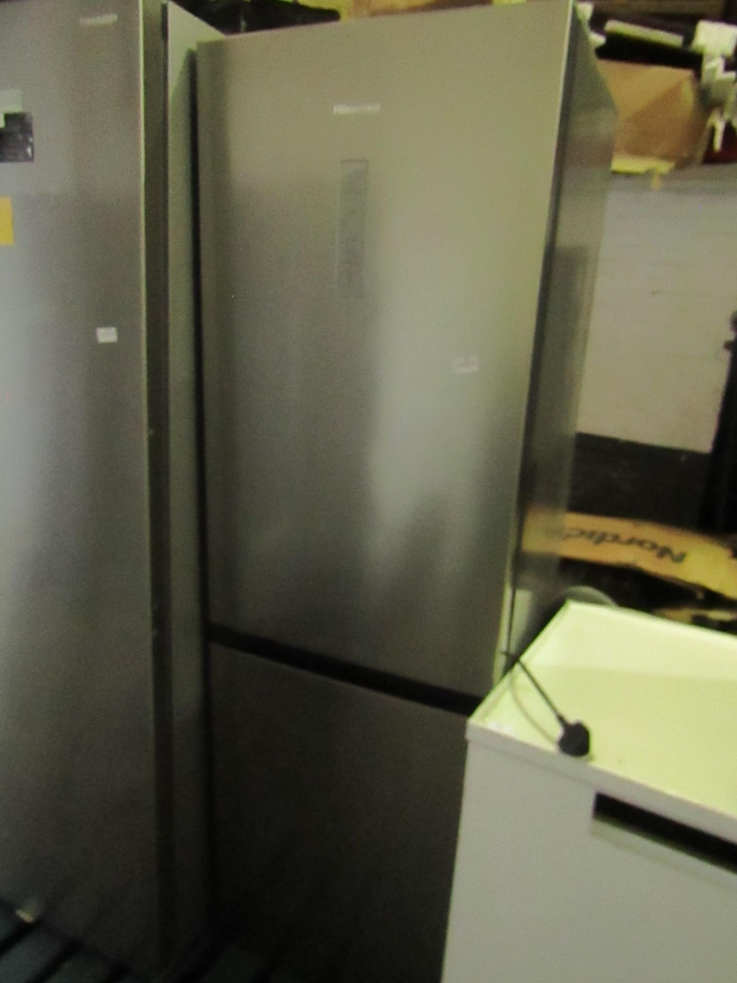 Hisense fridge freezer, untested due to damaged plug.