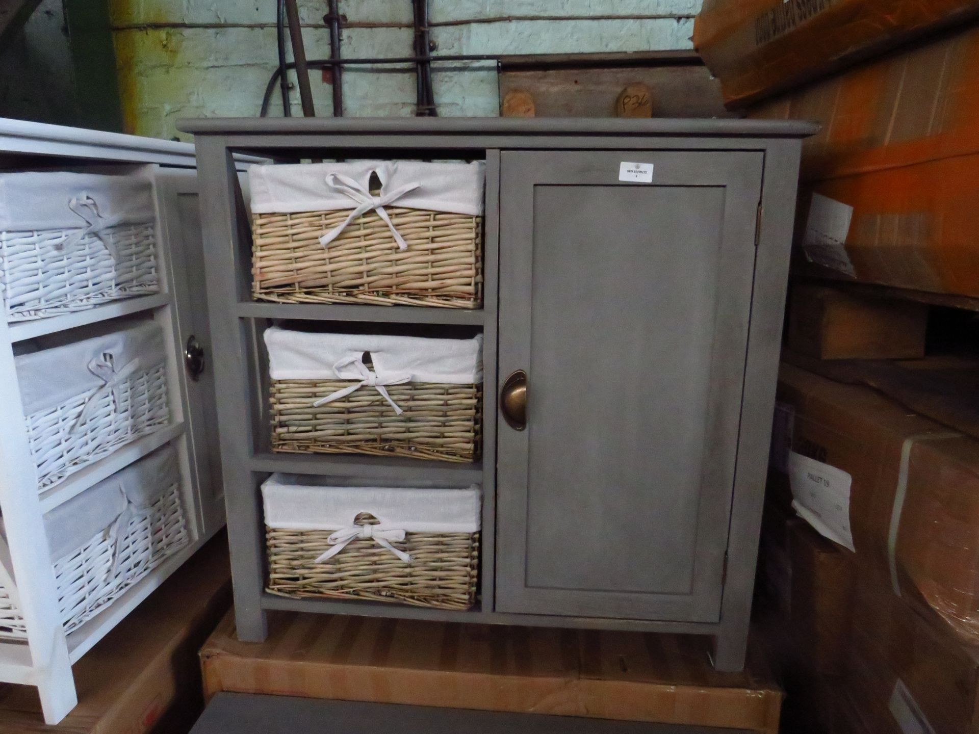 Three tier storage unit with cupboard, no major damage.