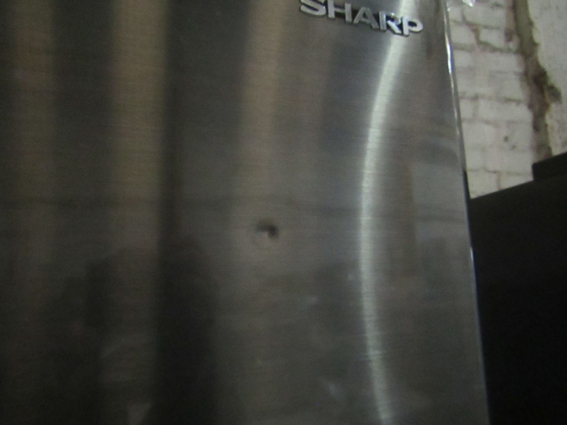 Sharp 4 door American fridge freezer, getting cold in both compartments when plugged in, has a - Image 2 of 5