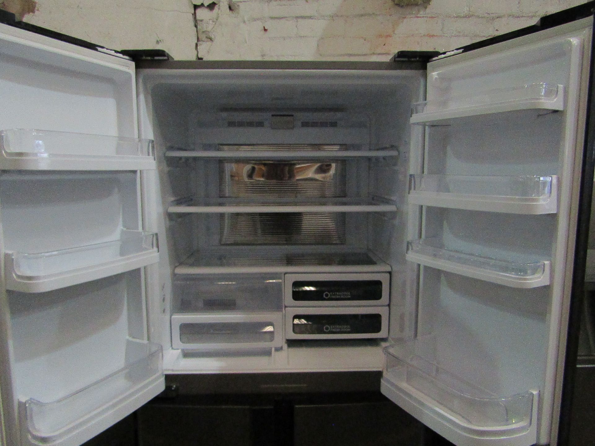 Sharp 4 door American fridge freezer, getting cold in both compartments when plugged in, has a - Image 3 of 5