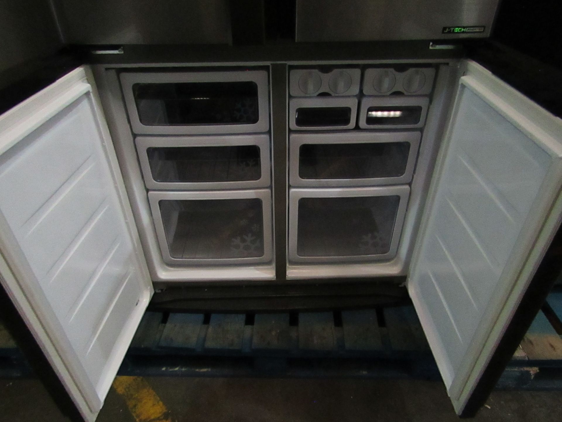 Sharp 4 door American fridge freezer, getting cold in both compartments when plugged in, has a - Image 4 of 5