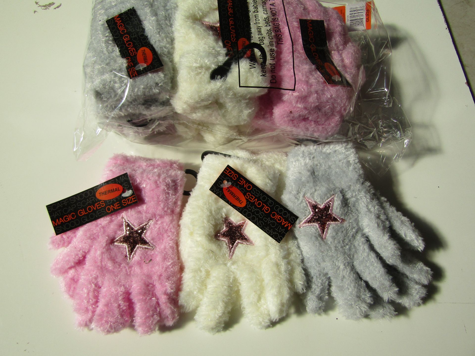 12 X Pairs of Kids Magic Gloves One Size Pink Grey White 4 of Each New & Packaged