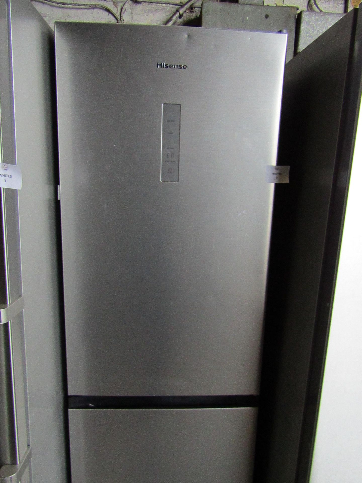 Hisense - Tall Free-Standing Fridge/Freezer - Small Dints On Front, Items Powers On and Gets Colds.