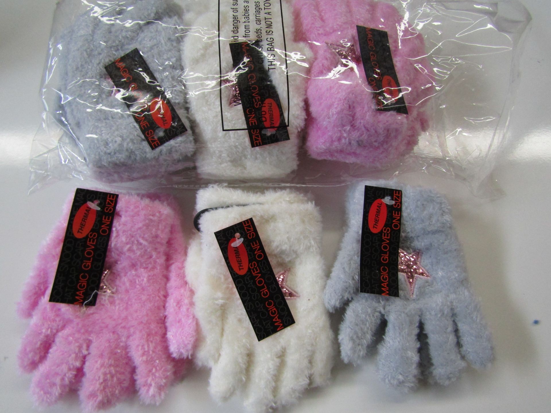 12 X Pairs of Kids Magic Gloves Pink Grey Cream One Size New & Packaged