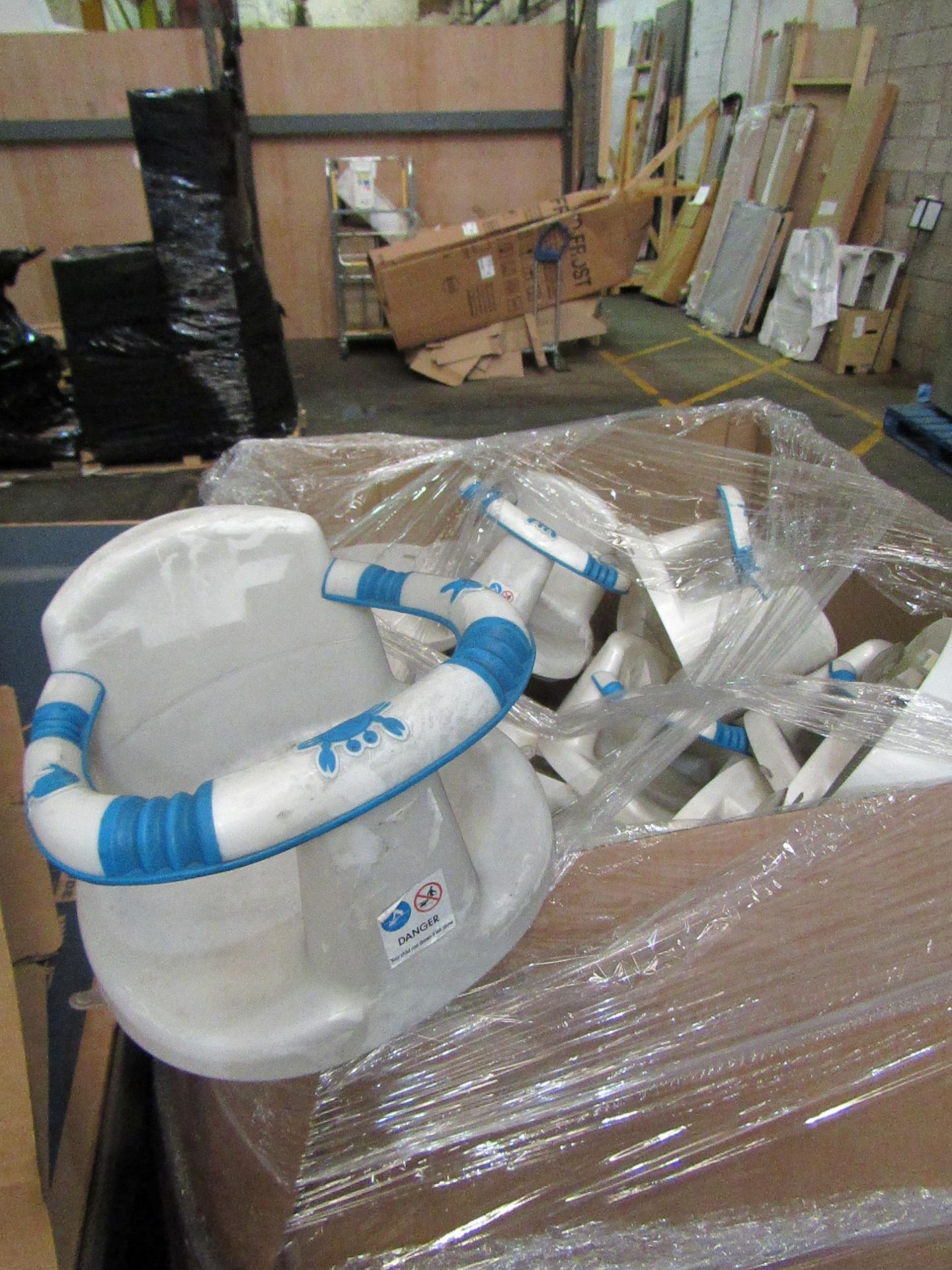 Pallet of approx 25 plastic baby bath seats new but has gotten dirty while stored.