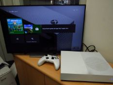 Xbox one S All digital console, powers on and  goes through to the home screen, comes with