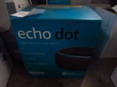 Amazon Echo Dot, powers on but havent chaecked it any further, comes with original box and power