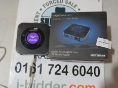 Netgear Gigabit Class LTE mobile router, untested and boxed.