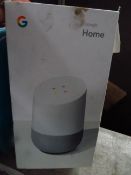 Google Home smart speaker, powers on and makes a noise, we havent fully set it up, coems with